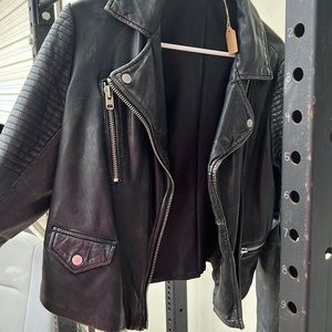 Perfectly worn in 100 percent premium leather jacket